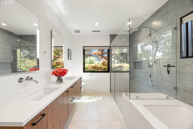 2930 NW Quimby St, Portland, OR 97210 - full bath featuring tiled shower, double vanity, tile patterned floors, toilet, and recessed lighting