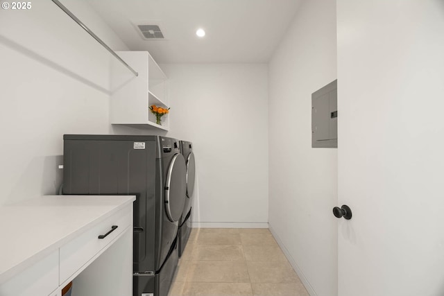 2930 NW Quimby St, Portland, OR 97210 - washroom with electric panel, washing machine and dryer, baseboards, recessed lighting, and light tile patterned flooring