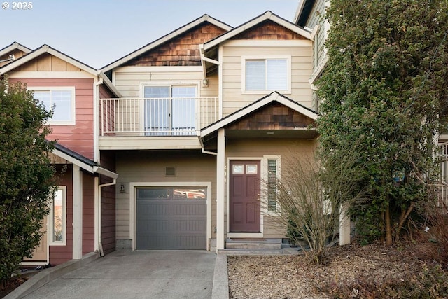 craftsman inspired home with a garage and a balcony