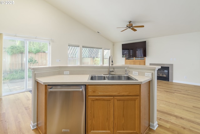 5470 Jeffrey Way, Eugene, OR 97402 - kitchen with a sink, open floor plan, light wood finished floors, a ceiling fan, and light countertops