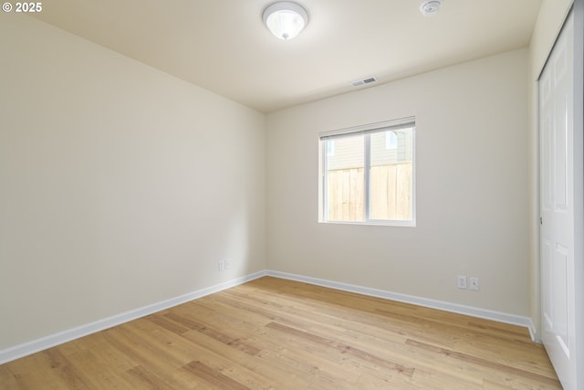 5470 Jeffrey Way, Eugene, OR 97402 - unfurnished bedroom with light wood finished floors, baseboards, and a closet