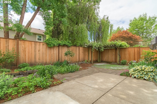 5470 Jeffrey Way, Eugene, OR 97402 - fenced backyard with a patio area