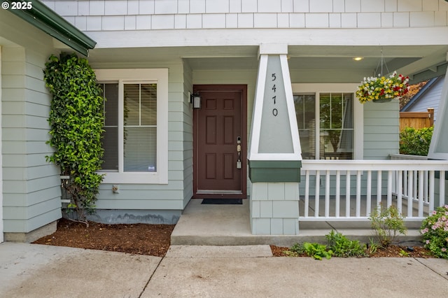 5470 Jeffrey Way, Eugene, OR 97402 - entrance to property with a porch