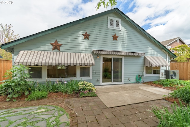 5470 Jeffrey Way, Eugene, OR 97402 - back of property with a patio area and a cooling unit
