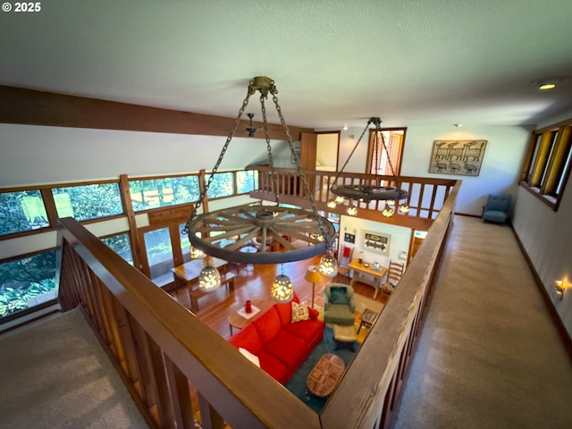 dining room featuring carpet and a textured ceiling