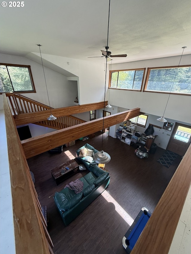 living room featuring ceiling fan and wood finished floors