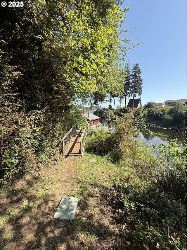 view of yard with a water view