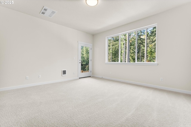 view of carpeted spare room