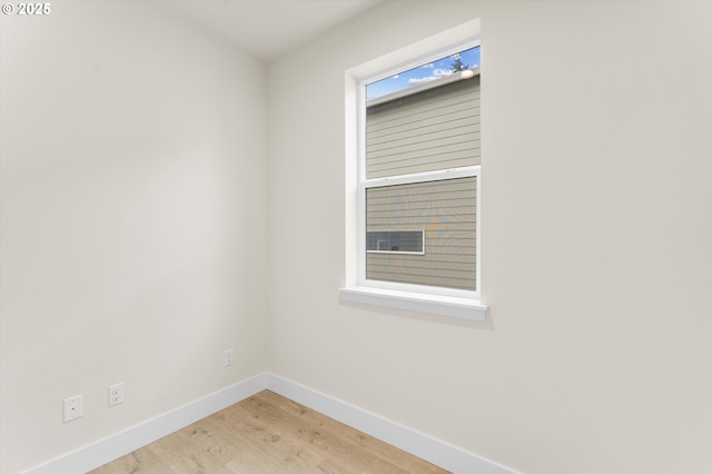 empty room featuring hardwood / wood-style floors