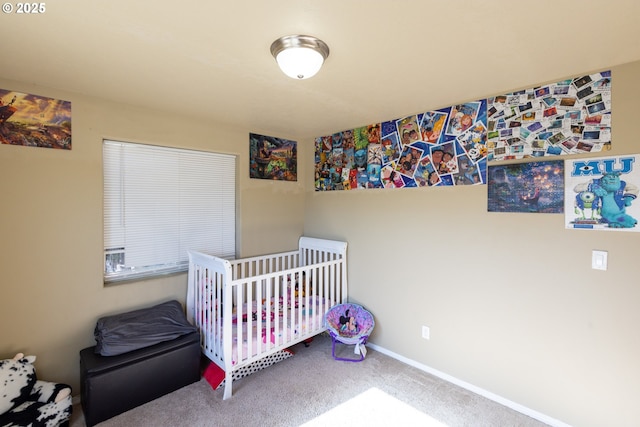 carpeted bedroom with baseboards