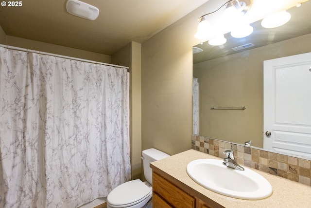 bathroom featuring visible vents, decorative backsplash, a shower with shower curtain, toilet, and vanity