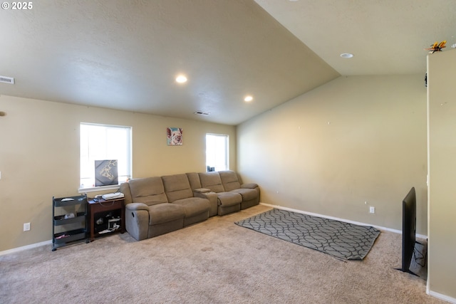 carpeted living area featuring recessed lighting, visible vents, vaulted ceiling, and baseboards