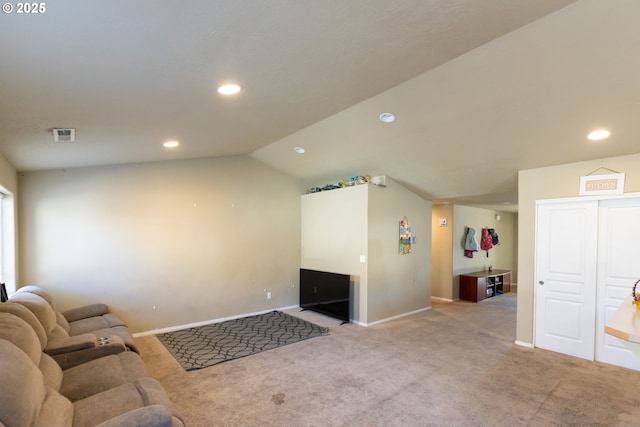 carpeted living area with lofted ceiling, visible vents, baseboards, and recessed lighting