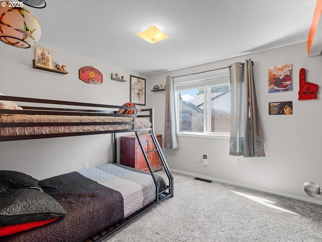 1908 NW 4th Ave, Battle Ground, WA 98604 - bedroom featuring carpet, baseboards, and a textured ceiling