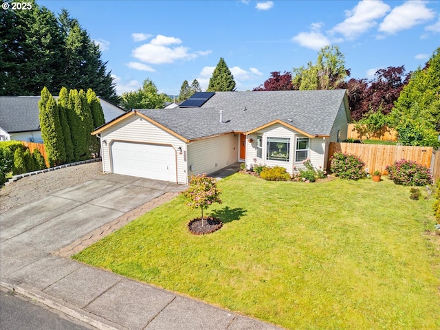 1908 NW 4th Ave, Battle Ground, WA 98604 - view of front of property featuring a garage, driveway, solar panels, and roof with shingles