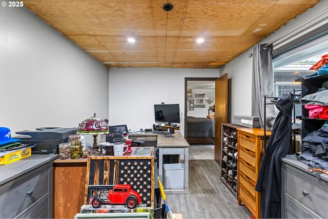 interior space featuring hardwood / wood-style flooring and wood ceiling