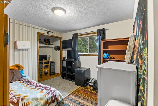 bedroom featuring a textured ceiling