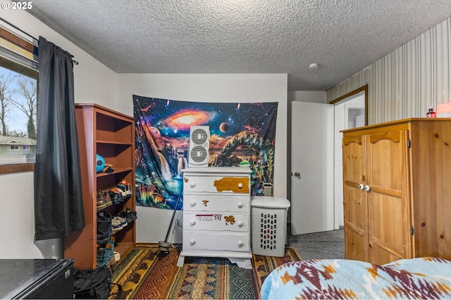 bedroom featuring a textured ceiling