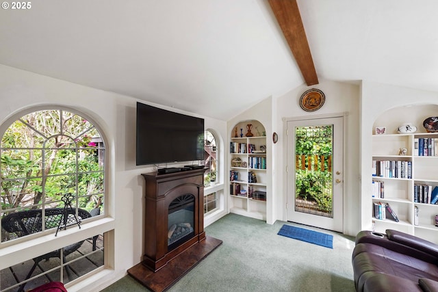93652 E Blue Bird Ln, North Bend, OR 97459 - living area featuring carpet, a glass covered fireplace, healthy amount of natural light, and built in shelves