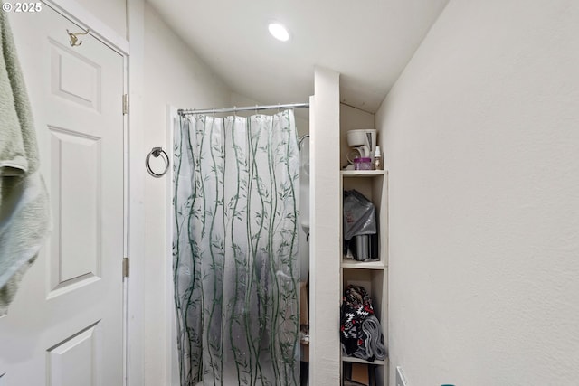 93652 E Blue Bird Ln, North Bend, OR 97459 - full bathroom featuring a shower with shower curtain