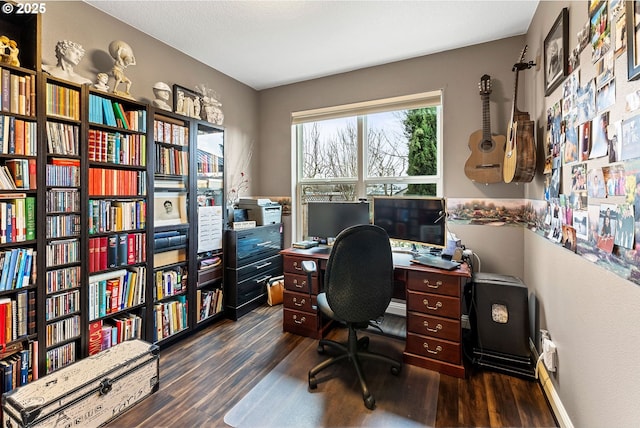 office with dark wood-type flooring