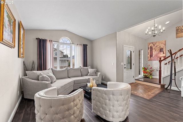 living room featuring lofted ceiling, a notable chandelier, and dark hardwood / wood-style floors