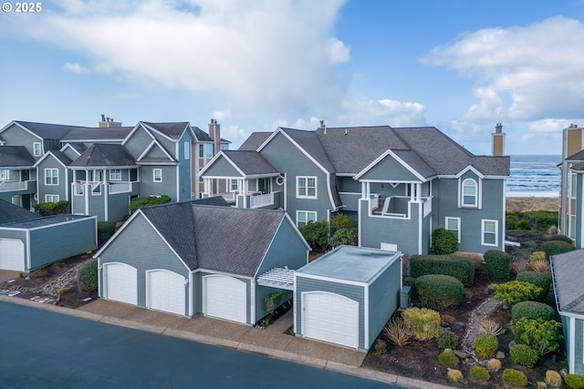 view of front of home with a water view