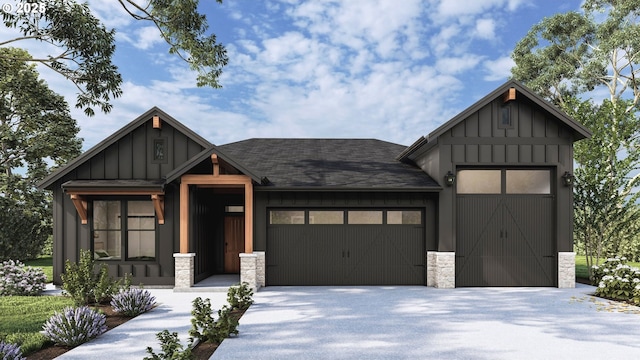 4108 N 12th Way, Ridgefield, WA 98642 - view of front of home featuring board and batten siding, a garage, a shingled roof, and driveway