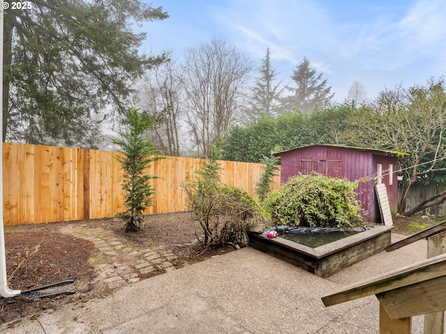 view of patio with a storage unit