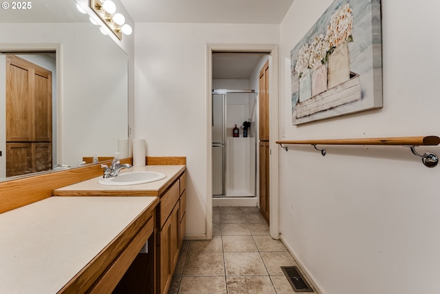 1278 Winery Ln, Eugene, OR 97404 - full bath featuring vanity, a shower stall, tile patterned flooring, and baseboards