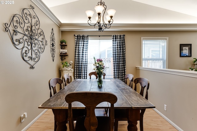 1278 Winery Ln, Eugene, OR 97404 - dining area featuring light wood-style flooring, a chandelier, plenty of natural light, baseboards, and crown molding
