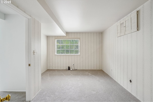 4242 SW Admiral St, Portland, OR 97221 - carpeted spare room featuring wallpapered walls