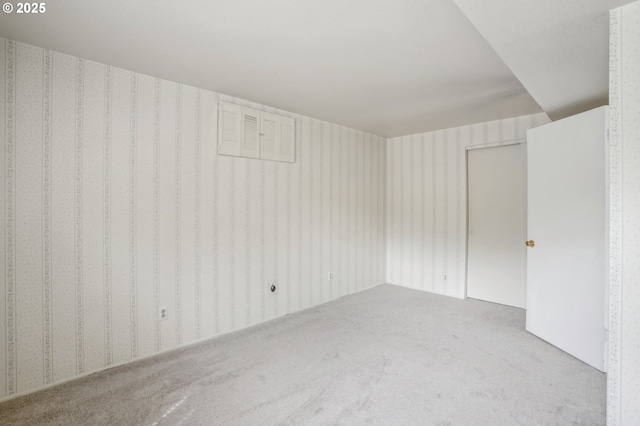 4242 SW Admiral St, Portland, OR 97221 - empty room featuring wallpapered walls and carpet