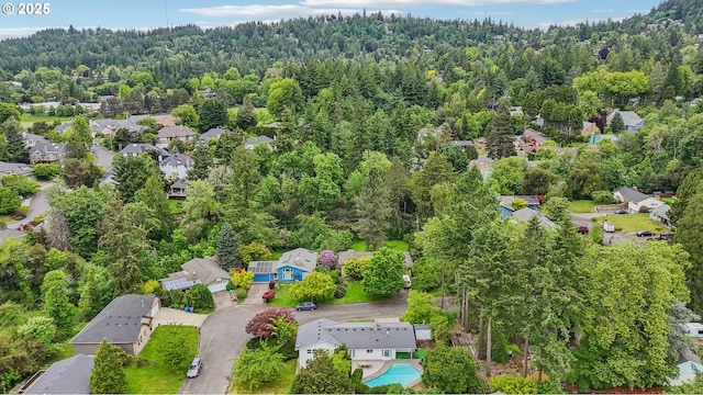 4242 SW Admiral St, Portland, OR 97221 - aerial perspective of suburban area featuring a forest
