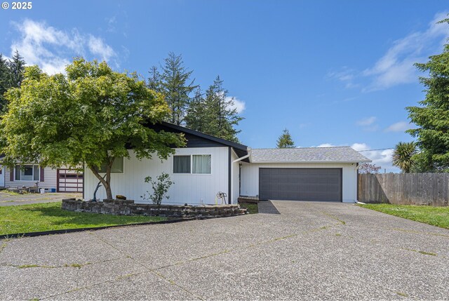 4004 Ginkgo Ave, Tillamook, OR 97141 - view of front of home featuring a garage and driveway