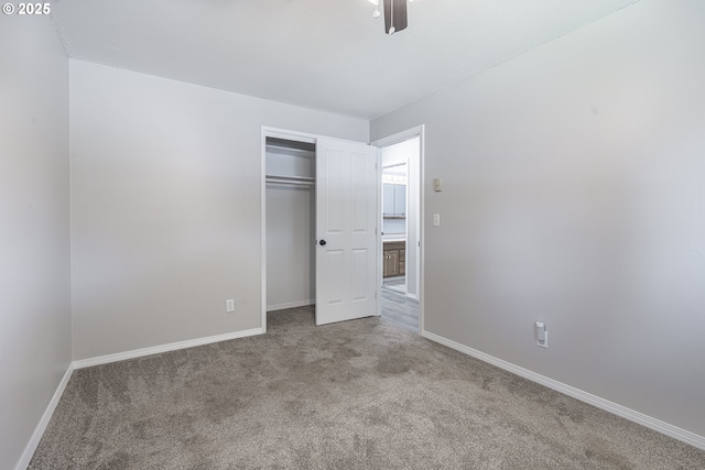 4004 Ginkgo Ave, Tillamook, OR 97141 - unfurnished bedroom featuring carpet floors, baseboards, a closet, and a ceiling fan
