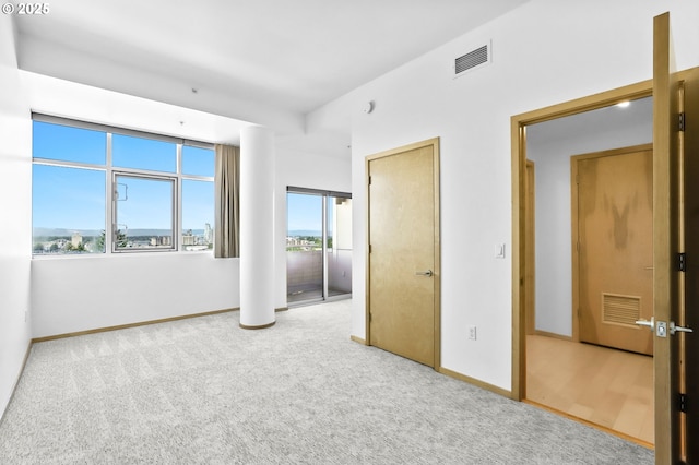 700 Washington St Unit 925, Vancouver, WA 98660 - carpeted empty room with baseboards