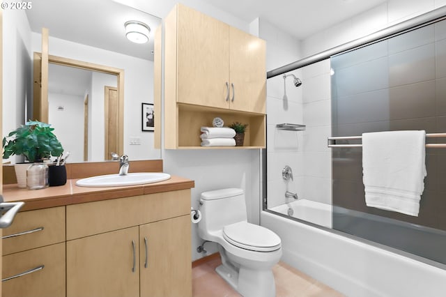 700 Washington St Unit 925, Vancouver, WA 98660 - bathroom with toilet, vanity, enclosed tub / shower combo, and tile patterned floors