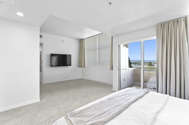 700 Washington St Unit 925, Vancouver, WA 98660 - unfurnished bedroom featuring carpet, baseboards, and recessed lighting