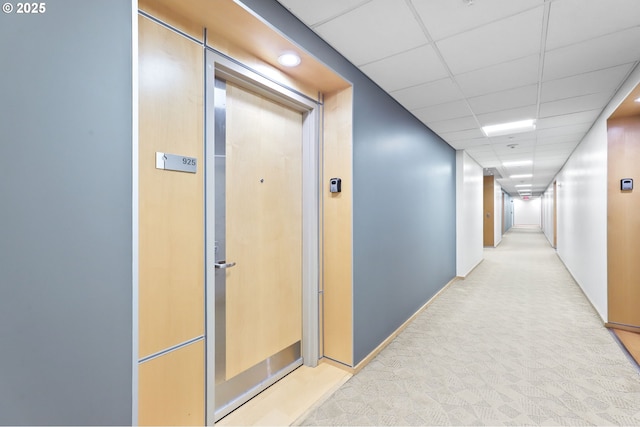 700 Washington St Unit 925, Vancouver, WA 98660 - corridor with light colored carpet, baseboards, and a drop ceiling