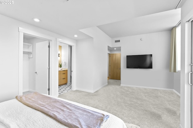 700 Washington St Unit 925, Vancouver, WA 98660 - carpeted bedroom with recessed lighting, baseboards, a spacious closet, connected bathroom, and a closet