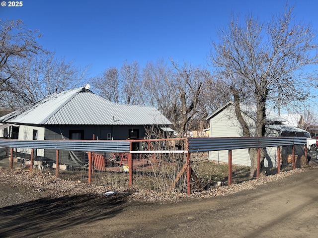 view of home's exterior with a carport