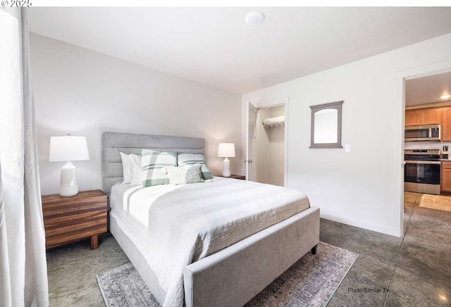 843 NE 11th St, Hermiston, OR 97838 - bedroom with a spacious closet, a closet, and baseboards