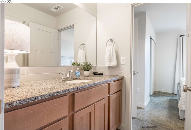 843 NE 11th St, Hermiston, OR 97838 - bathroom featuring vanity and baseboards