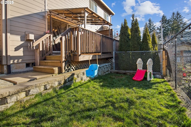 view of yard with a wooden deck