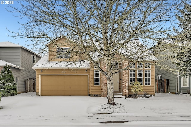 view of front of property featuring a garage