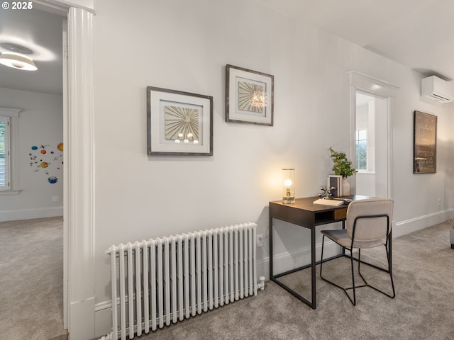 carpeted office space with radiator heating unit and a wall unit AC