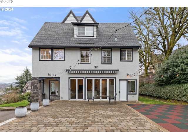 back of house with a patio area