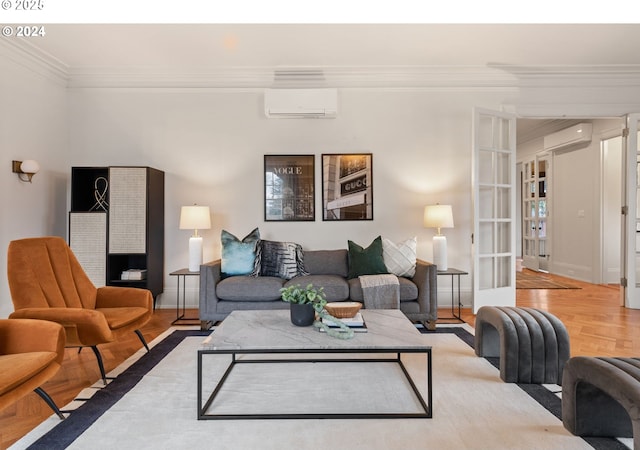 living room with parquet floors, ornamental molding, french doors, and a wall mounted AC