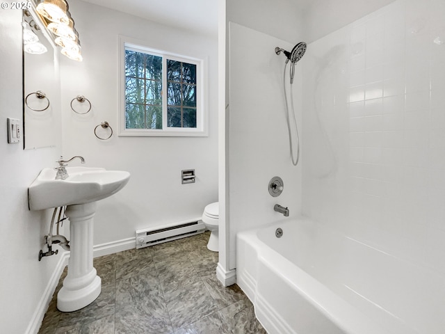 full bathroom with tub / shower combination, a baseboard radiator, baseboards, and toilet